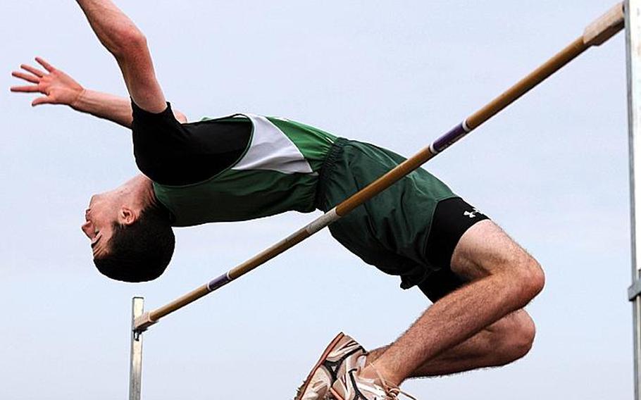 Kubasaki's Conor MacMannis clears the bar at 6 feet, 6 inches, or 1.98 meters, during Friday's field events in the Okinawa Activities Council weekly quadrangular track and field meet at Kubasaki High School,  Okinawa. MacMannis and Kadena's Lotty Smith each cleared 1.98, topping the old Pacific record of 1.97 set in 2005 by Kadena's Marquis Newton.