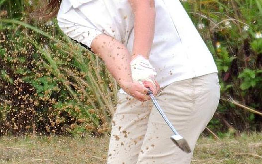 Kadena Panthers senior golfer Landis Mathis blasts out of a bunker during Wednesday's Day 2 action in the 2011 Okinawa Activities Council district golf championships at the 6,645-yard, par-72 Taiyo Golf Course, Gushikawa, Okinawa. Mathis carded a 94 to finish with a two-day total of 201, 57 over par and 21 shots ahead of runner-up Terah Whitehurst of Kubasaki.