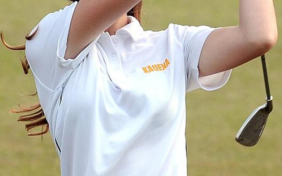 Kadena Panthers golfer Helina Tassi eyes her approach shot during Wednesday's Day 2 action in the 2011 Okinawa Activities Council district golf championships at the 6,645-yard, par-72 Taiyo Golf Course, Gushikawa, Okinawa. Tassi carded a 106 on Wednesday and finished with a two-day total of 226, tied for third place with Kubasaki's Logan Ratcliff and 25 shots behind island champion and senior teammate Landis Mathis.