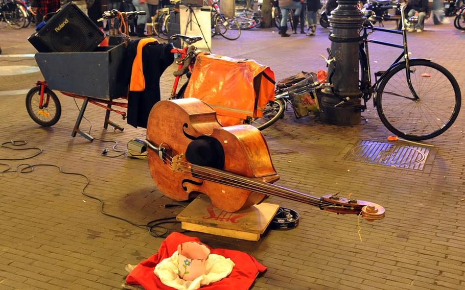 A Leidseplein still life. The bar- and restaurant-lined Leidseplein is popular with tourists and locals alike, and a place to enjoy free entertainment.