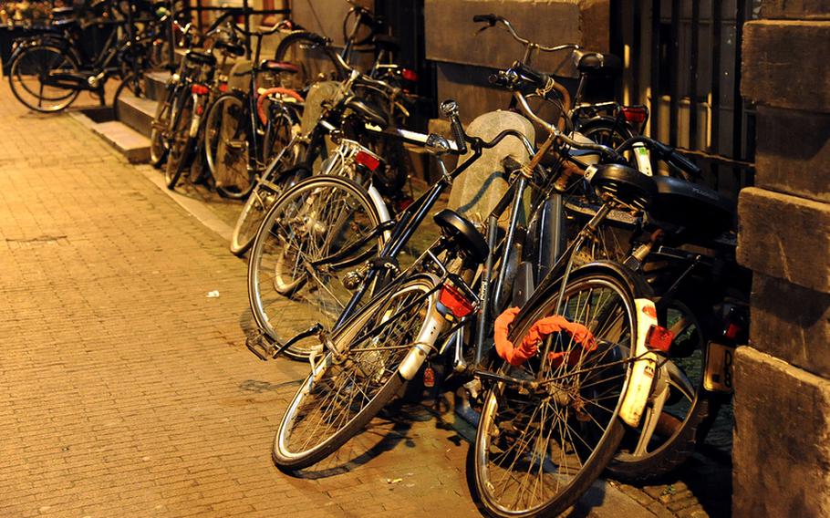 Day or night, bicycles are always part of the scene in Amsterdam.