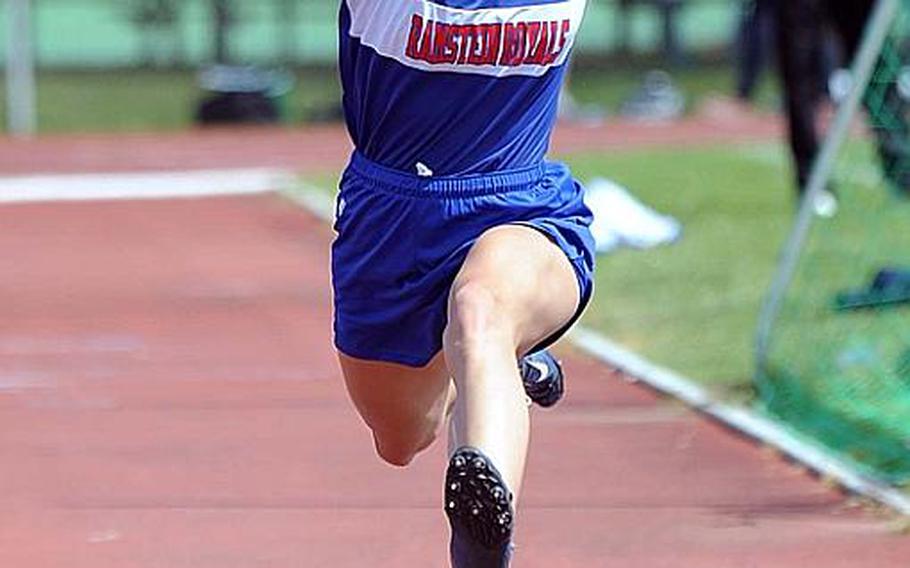 Tara Lookabough of Ramstein sails through the air on her way to winning the girls triple jump on Saturday in Heidelberg with a leap of 35-091/2. She also won the high jump.