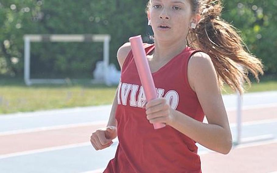 Aviano's Shelby McHugh runs the anchor leg Saturday in the girls 4x800 relay at a track meet in Pordenone, Italy between the host Saints, Vicenza and Naples. McHugh won the 800 with a time of 2 minutes 41.3 seconds and won the 1,500 in 5:33.9.