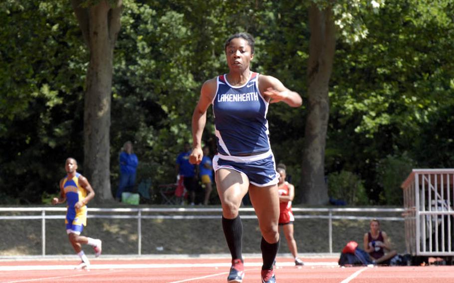 Lakenheath senior Jasmin Walker starts her sprint during the girls long jump at the 2011 DODDS-Europe Track and Field Championships in Russelsheim, Germany.  Walker defended her long jump title by placing first in the event.