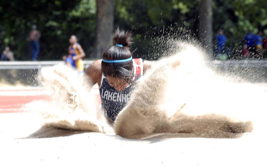 Lakenheath senior Jasmin Walker lands after her first-place jump during the girls long jump at the 2011 DODDS-Europe Track and Field Championships in Russelsheim, Germany.