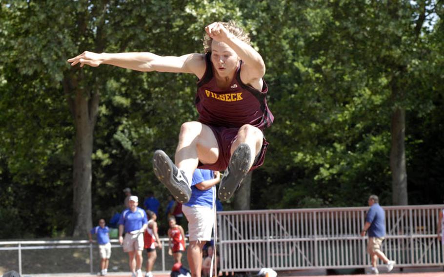 Vilseck senior Dane Gray gets ready to land during the boys triple jump at the 2011 DODDS-Europe Track and Field Championships in Russelsheim, Germany.  Hohenfels senior Leon Atkins walked away with first place in the event.