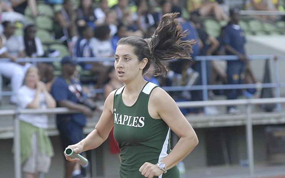 Naples senior Katey Chartier runs the anchor leg of the girls 1,600 sprint medley at  the 2011 DODDS-Europe Track and Field Championships in Russelsheim, Germany. The Naples team finished fourth with a time of 4 minutes, 43.24 seconds.