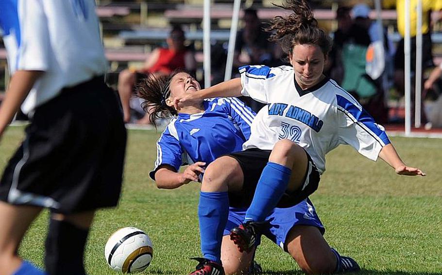 Brussels' Alexandra McVicker, left, and Rota's Thais Gartland-Bonet collide in a hard-fought Division III girls soccer final won by Rota, 1-0.