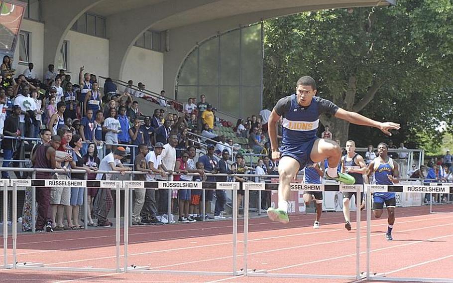 Heidelberg junior David Hoke breezes ahead of the field in the boys 300 meter hurdles at  the 2011 DODDS-Europe Track and Field Championships in Russelsheim, Germany. Hoke's winning time of 40.62 was more than a second faster than second-place finisher, Ramstein sophomore Michael Johnson.