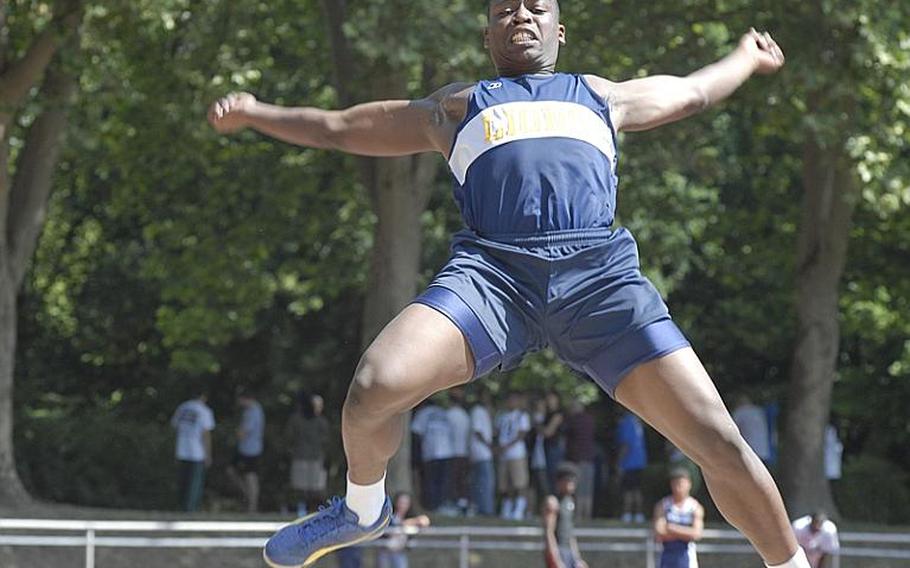 Heidelberg junior Wayne Dawkins prepares to land during the boys long jump during day two of  the 2011 DODDS-Europe Track and Field Championships in Russelsheim, Germany.