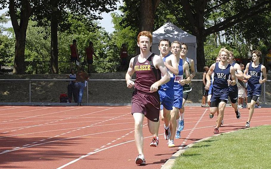 Vilseck senior Zane Kennedy leads Ramstein sophomore Jack Scranton and the rest of the pack during a turn in the boys 1,500 meter run at the 2011 DODDS-Europe Track and Field Championships in Russelsheim, Germany. In the end Scranton was too much, as he won his second gold medal of the tournament with a time of 4 minutes, 9.80 seconds. Kennedy finished second.