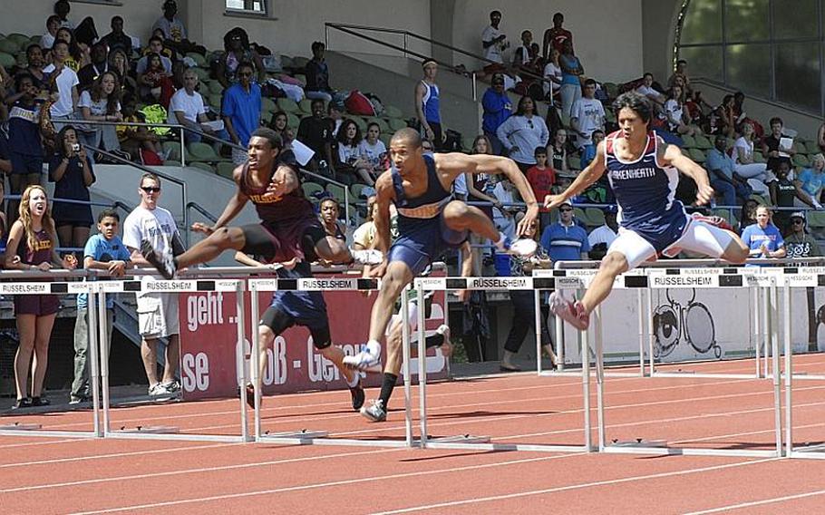 Heidelberg senior Aaron Tribble-Knowles, center, tries to hold off Vilseck junior Renanzo Williams, left, and Lakenheath Patrick Misinick at the 2011 DODDS-Europe Track and Field Championships in Russelsheim, Germany. Tribble-Knowles finished in 16.11 seconds, topping Williams (16.38) and Wiesbaden senior Kenyatta Hill (16.44).