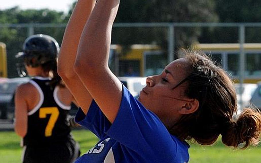 Seoul American Falcons first baseman Jenna Jackson squeezes a popup by Kadena's Amber Criderfor the final out of Thursday's championnship game in the 2011 Far East High School Girls Softball Tournament at Kadena Air Base, Okinawa. The Falcons beat the defending champion and host Panthers, 14-10, in eight innings.