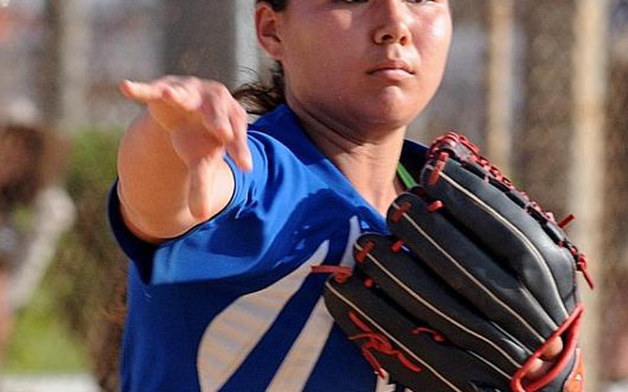 Seoul American Falcons pitcher and tournament Most Valuable Player Katie Darby makes a throw to first base against Kadena during Thursday's championnship game in the 2011 Far East High School Girls Softball Tournament at Kadena Air Base, Okinawa. The Falcons beat the defending champion and host Panthers, 14-10, in eight innings.