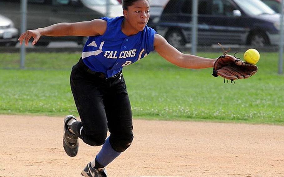 Seoul American Falcons shortstop Deidre Jones can't find the handle on a Kadena Panthers ground ball during Thursday's championnship game in the 2011 Far East High School Girls Softball Tournament at Kadena Air Base, Okinawa. The Falcons beat the defending champion and host Panthers, 14-10, in eight innings.