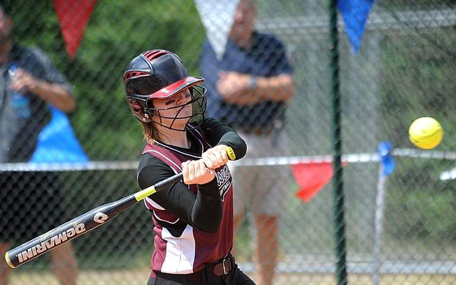 Vilseck's Taylor Hall takes aim as she smacks the ball out of the park for a solo home run against Wiesbaden in opening-day action at the DODDS-Europe softball championships on Thursday.Vilseck went on to win 11-10 on Alex Lopez's RBI hit.