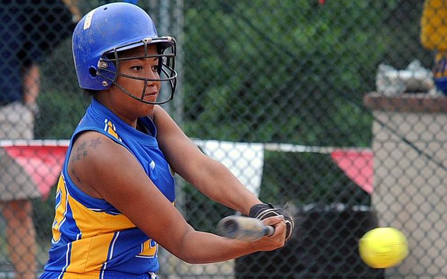 Wiesbaden's LeAmber Thomas  connects for a hit in the Warriors' 11-10 loss to Vilseck in opening-day action at the DODDS-Europe Division softball tournament in Ramstein on Thursday.