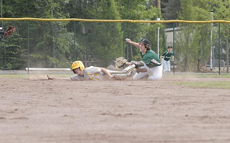Naples sophomore Joseph Pitts tags out a stretching Reed Woods, a Vicenza sophomore, during Friday's Division II semifinal matchup between the two teams.  Vicenza rallied with 10 runs in the sixth inning to win the game 14-12 and advance to Saturday's final.