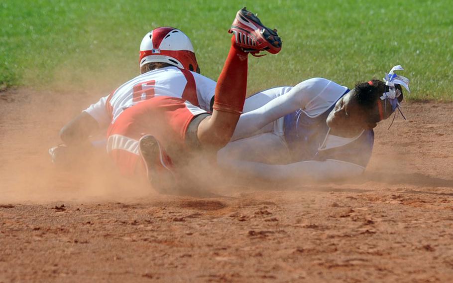 Ramstein's Allison Shelton, right, puts the tag on a sliding Saige Isla of Kaiserslautern in a Division I semifinal at the DODDS-Europe softball championships. Isla was out and the Royals beat K-town 10-7, to meet Patch in Saturday's title game.