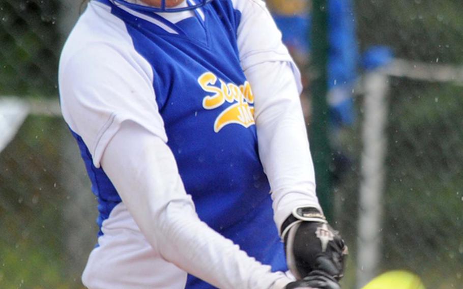 Sigonella's Alexis Palmer connects for an RBI hit in the Jaguars' 10-8 win over Rota in a Division III semifinal at the DODDS-Europe softball championships in Ramstein, on Friday. Sigonella will face Incirlik in Saturday's title game.