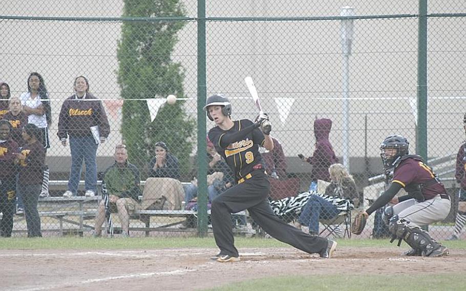 Patch slugger C.J. Kellogg lines a foul ball down the third-base line during Friday's Division I baseball seminfinal matchup against Vilseck.  Patch won, 16-0.