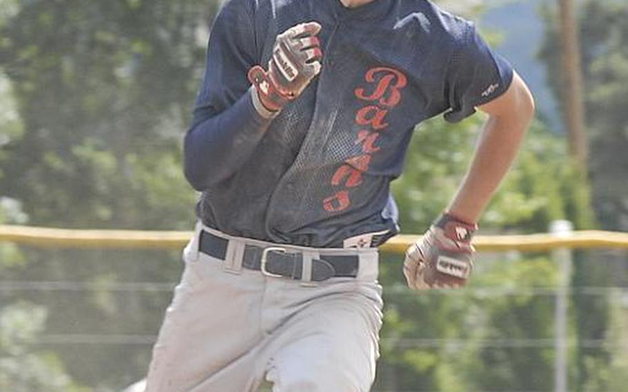 Bitburg junior Matt Flood rounds third on his way to home during Bitburg's 5-3 victory over Vicenza in the DODDS-Europe Division II baseball championship game in Ramstein, Germany.