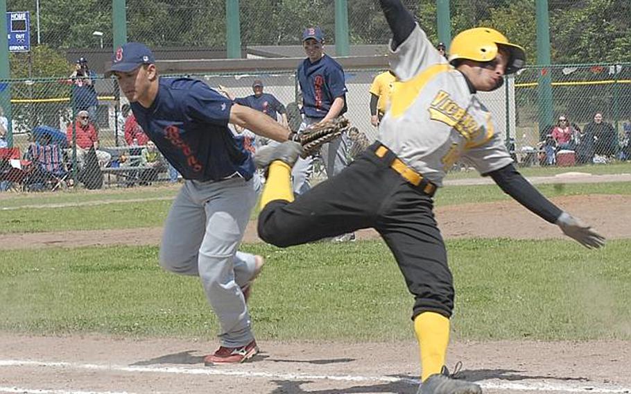 Vicenza sophomore Johnny Suero tries to avoid the tag by Bitburg junior Austin Schmidt during Saturday's Division II baseball championship game.  Bitburg won 5-3.