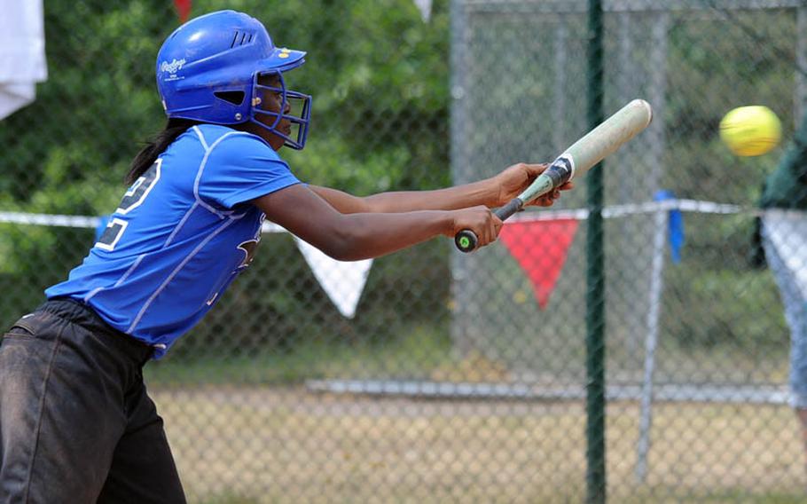 Incirlik's Sherell McIver lays down a bunt that scored two runs in the Hodjas' 13-11 loss to Sigonella in the championship game of the Division III softball tournament.