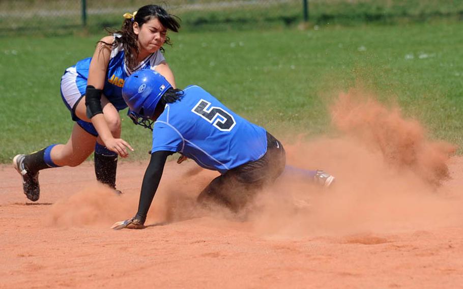 Incirlik's Breana Plummer slides into second before Sigonella's Mikaela Palmer can put on the tag. Sigonella beat Incirlik in a close game, 13-11.