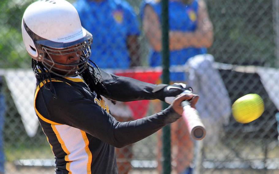 Patch's Janelle Loney connects for a RBI double in the Lady Pathers' 8-2 win over Ramstein in the final game of the  Division I softball tournament.