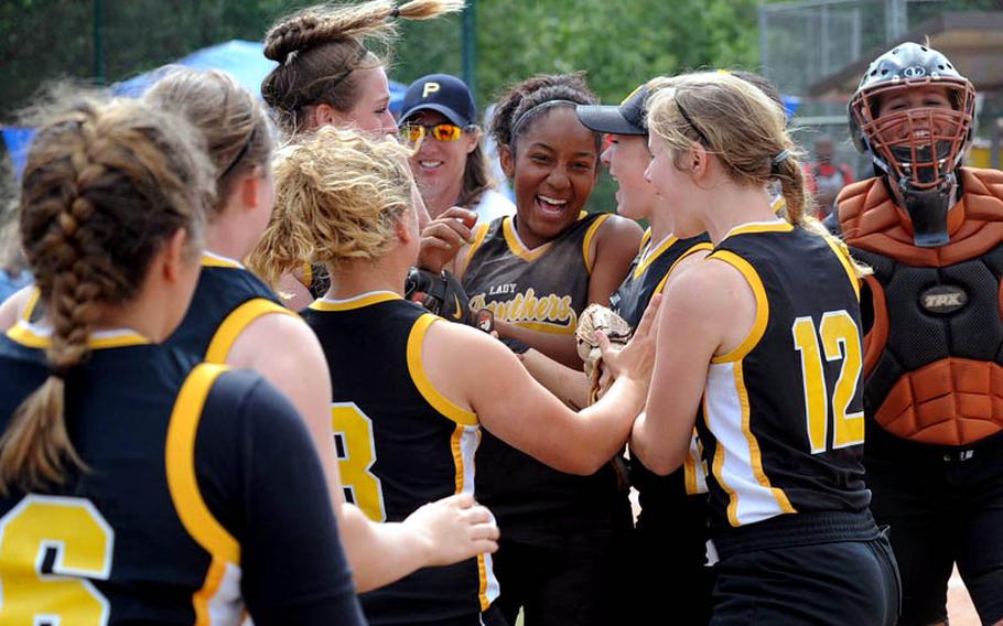 Patch teammates congratulate Bianca Lopez, center, who pitched her Lady Panthers to a 8-2 win over defending champion Ramstein in the Division I final at the DODDS-Europe softball championships on Saturday