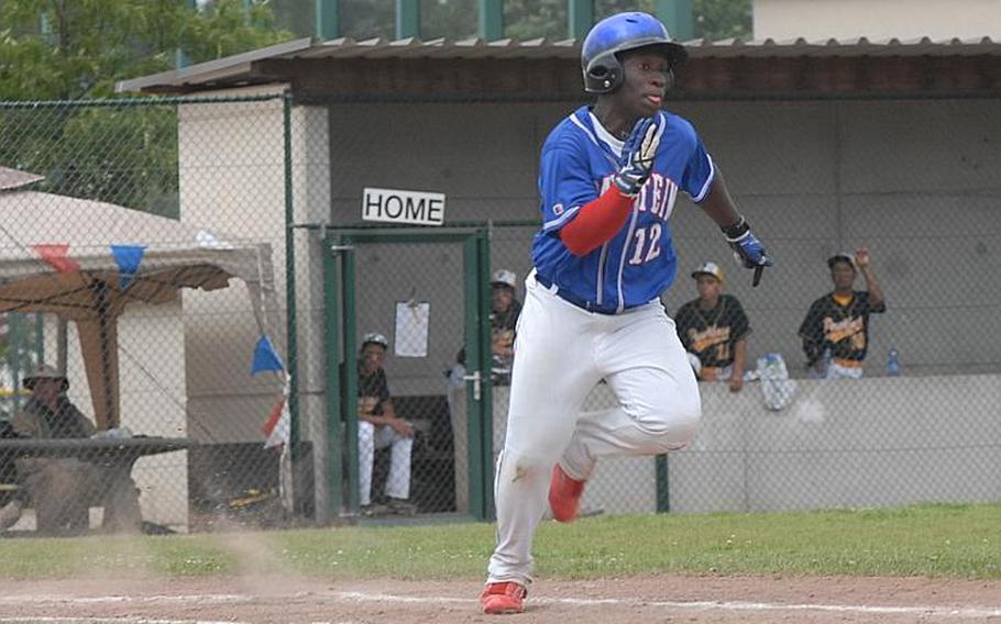 Ramstein junior Caleb Guerrido tries to beat out an infield hit during Saturday's Division I championship game in Ramstein, Germany.  Patch used a walk-off hit by senior Cavan Cohoes to defeat Ramstein 8-7.