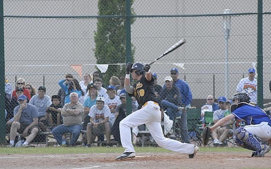 Patch senior Cavan Cohoes watches his game-winning hit head for the outfield the Division I baseball championship game in Ramstein, Germany.  The Panthers, the defending champs, squeaked by Ramstein, 8-7, in a battle of the tournament's top two seeds.