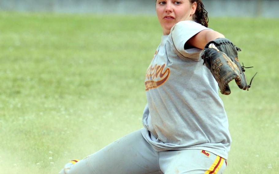 Osan Air Base second baseman Jessica Meadows throws to first base against Kyungnam, Korea's national team, during Monday's women's double-elimination championship games in the 21st Pacificwide Open Interservice Softball Tournament at Yongsan Garrison, South Korea. Kyungnam beat Osan 12-6 and 13-12 to claim the title.