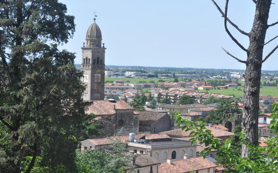 The bell tower of the cathedral and much of the skyline of Soave is seen from a viewpoint on the walk up to the entrance to the walls that surround the city.