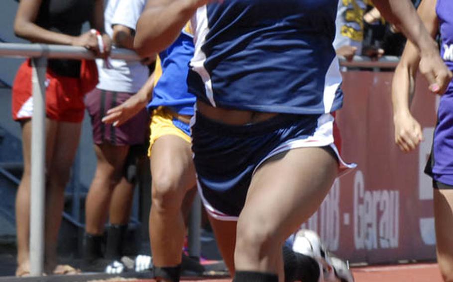 Lakenheath senior Jasmin Walker breaks away from the field during a preliminary heat of the girls 100 meter dash at the 2011 DODDS-Europe Track and Field Championships in Russelsheim, Germany.