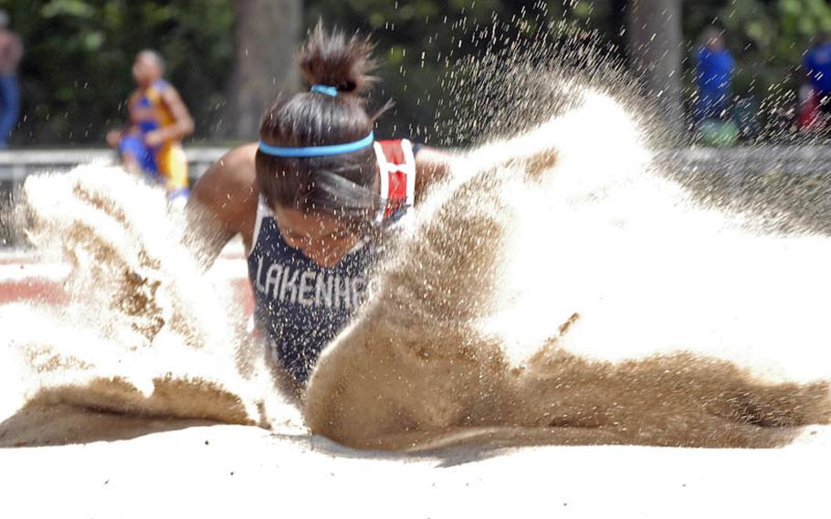 Lakenheath senior Jasmin Walker lands after her first-place jump during the girls long jump at the 2011 DODDS-Europe Track and Field Championships in Russelsheim, Germany.