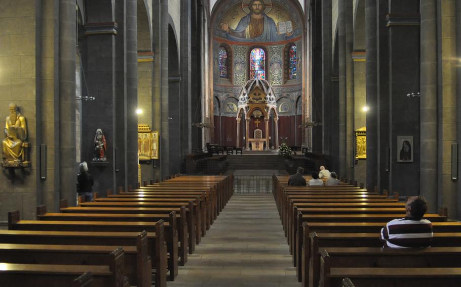 The inside of the church at Maria Laach Abbey. The monastery was founded in 1093 by Count Palatine Henry II, who was childless and wished to secure his good graces with God. His remains are encased in an elaborate, colorfully painted sarcophagus that depicts him holding the finished monastery in his hand. 
Seth Robbins/Stars and Stripes