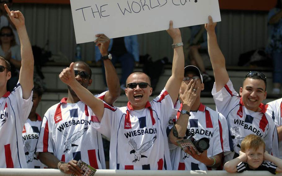 Members of the Wiesbaden soccer club show their support for the U.S. Women's National Team at Thursday's practice session at SG Kirchheim soccer field in Heidelberg, Germany, before the team's second 2011 World Cup game against Colombia.