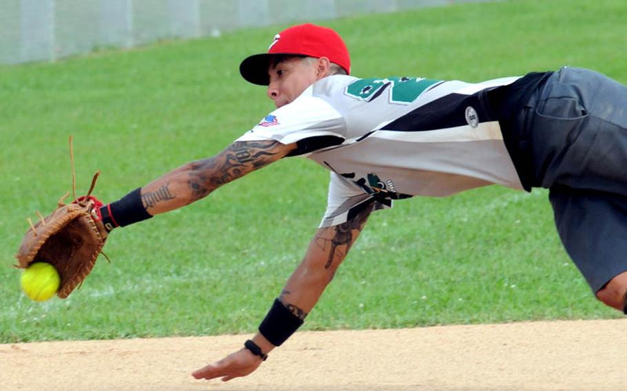 Hit Squad third baseman J.T. Torres dives for a Club Red ground ball during Saturday's pool-play game in the 2011 Firecracker Shootout Pacificwide interservice softball tournament at Camp Foster, Okinawa. Club Red silenced Hit Squad, 11-1.