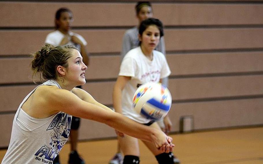 Melissa Menschel, 17, a junior from Bitburg, Germany, bumps a ball Monday during this year's DODDS-Europe volleyball camp at Vilseck High School.