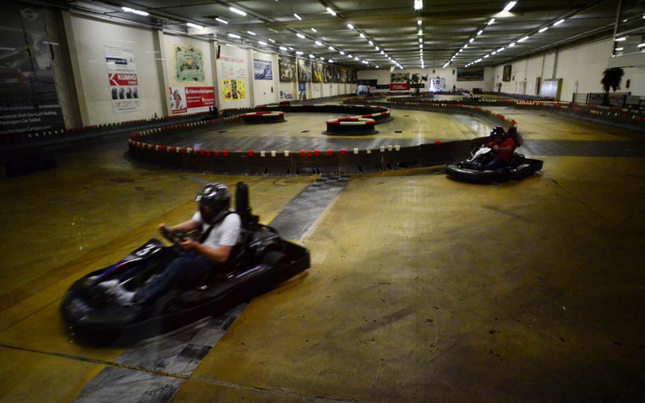 Customers at the Go! Indoor-Kart track near Kaiserslautern, Germany, race at top speeds of 40 miles per hour.