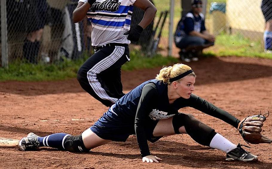 Cary Price, Lakenheath's first baseman, stretches for the ball during the U.S. Forces Europe softball championship at Spangdahlem Air Base.