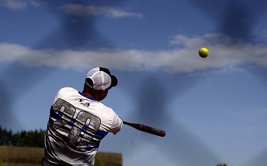 Ramstein third-baseman Mark Noll hits the ball during the U.S. Forces Europe men's softball championship game.