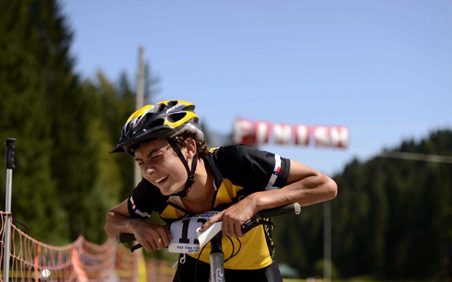Alex Denikiewicz, 16, finally catches his breath Saturday after he won his age group in the 6-kilometer cross country race in Garmisch, Germany, then later completed the 25-kilometer mountain bike event.