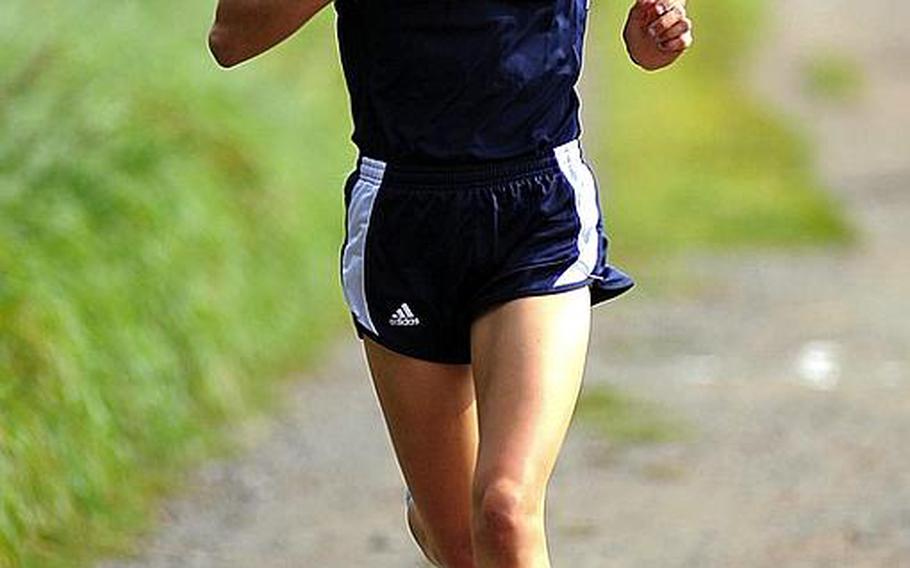 Ramstein's Jessica Kafer finishes ahead of the pack to win a cross country race at Ramstein-Miesenbach, Germany, last year. The runner-up at last season's championships, she will be returning this year for the Royals.