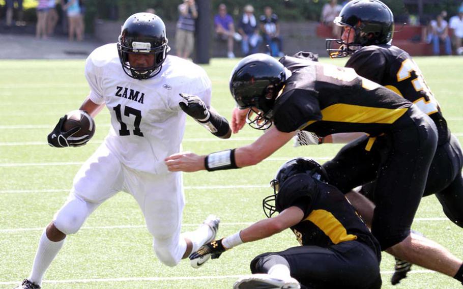 Zama American Trojans sophomore running back Mitchell Harrison, shown here in a game from earlier this season, ran for 228 yards and two touchdowns on 15 carries in Saturday's 42-26 home victory over Osan American. 