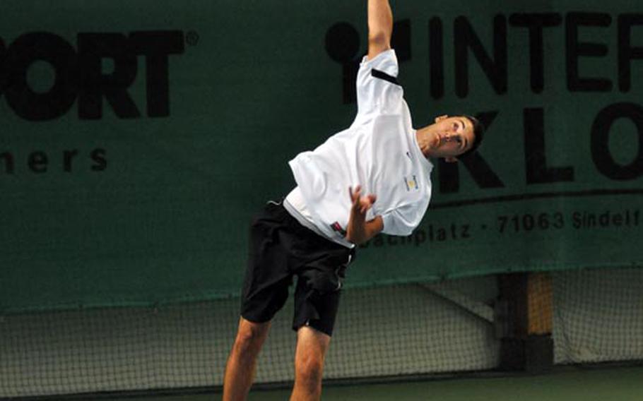 Ajdin Tahirovic serves against Baumholder opponent Cameron Koch on Saturday during a match at Patch. Tahirovic is a sophmore and the defending DODDS-Europe boys champion.