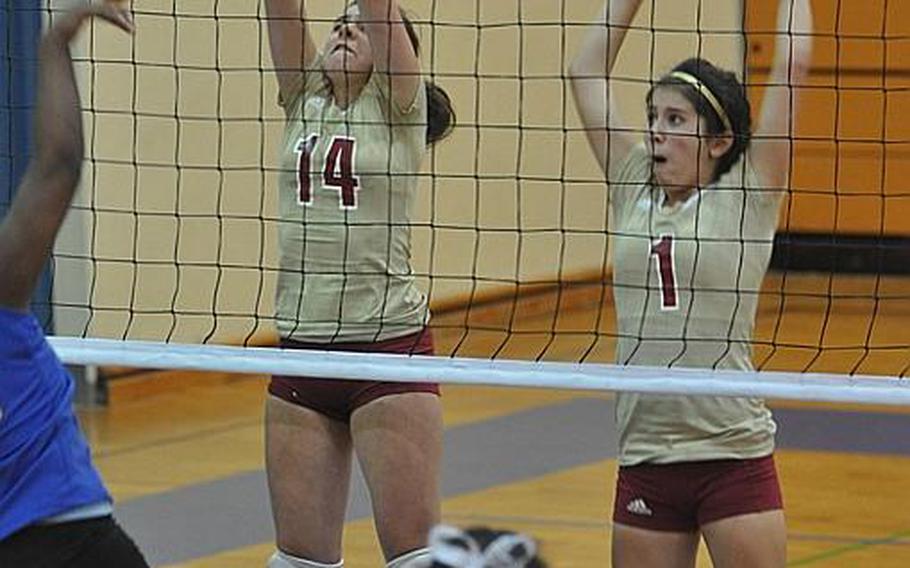Vilseck's Adriana Sued, left, and Taylar Mata go up for a block Saturday against the Bamberg Barons.