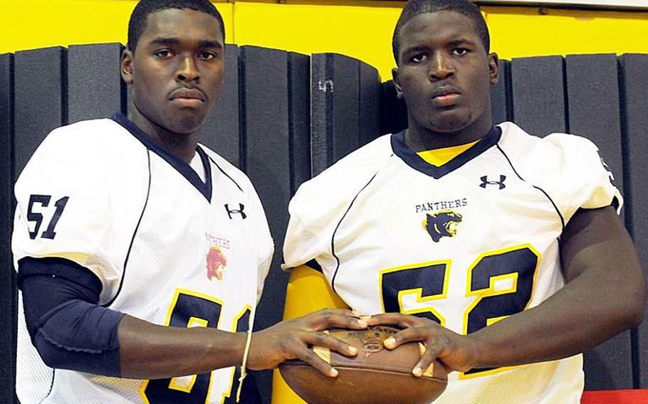 Guam High defensive leaders Nijee Smith and Theartris Eaton look at the fact that the Panthers were forced to forfeit two victories for turning in an incomplete roster to the league as an incentive to work harder toward defending their Interscholastic Football League title.